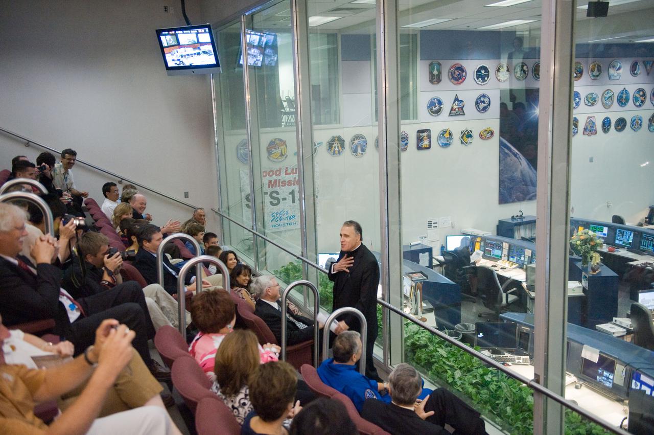 JSC2011-E-046605 (21 May 2011) --- His Eminence Daniel Cardinal DiNardo, Archbishop of Galveston-Houston, speaks to a group of guests in the viewing room of the Mission Control Center at NASA?s Johnson Space Center following a special call from Pope Benedict XVI to the STS-134 and Expedition 27 crews on the International Space Station. The event was conducted from The Vatican at 6:11 a.m. (CDT) on May 21, 2011, and aired live on NASA television. Photo credit: NASA