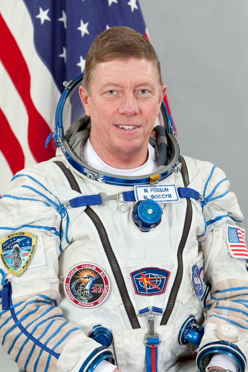 JSC2011-E-046616 (14 Feb. 2011) --- NASA astronaut Mike Fossum, Expedition 28 flight engineer and Expedition 29 commander, attired in a Russian Sokol launch and entry suit, takes a break from training in Star City, Russia to pose for a portrait. Photo credit: Gagarin Cosmonaut Training Center