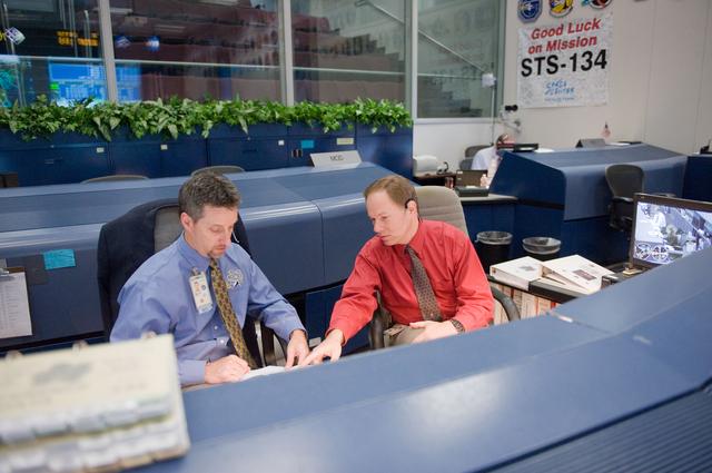 NASA image: STS-134 Orbit 1 flight controllers on console during AMS install 