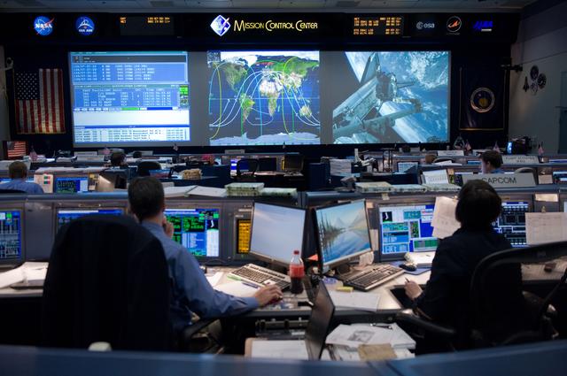NASA image: STS-134 Orbit 1 flight controllers on console during AMS install 