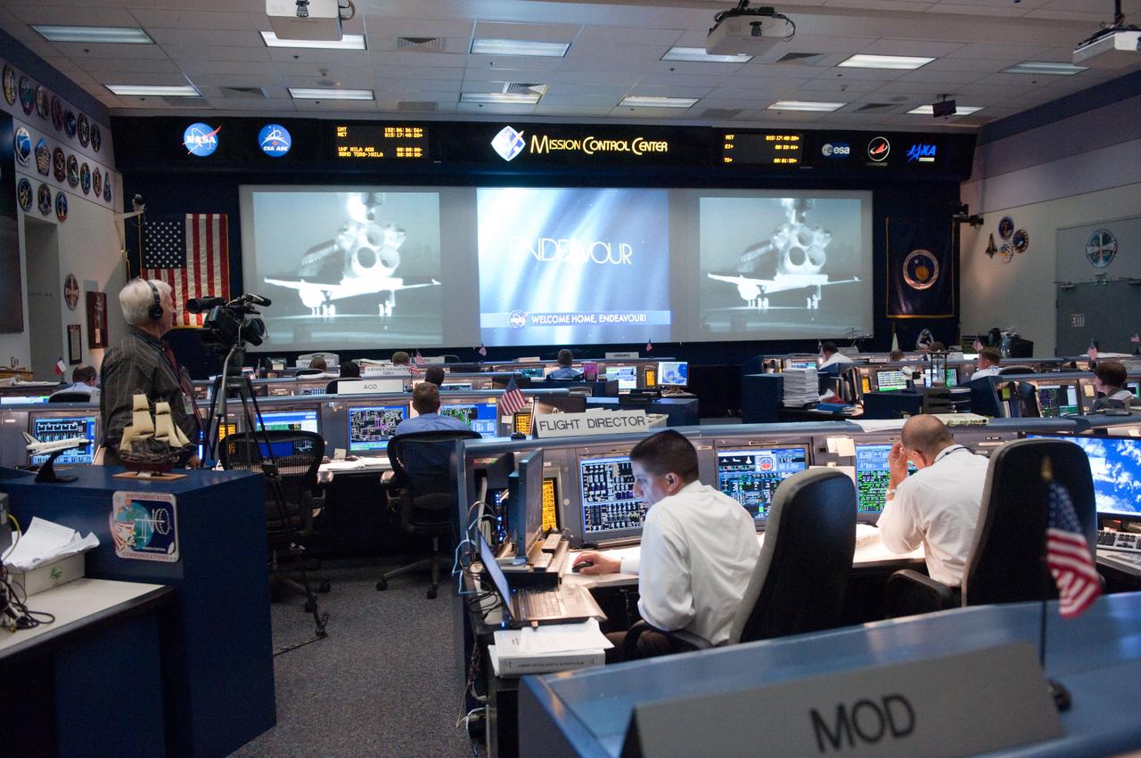 JSC2011-E-050168 (1 June 2011) --- An overall view of the space shuttle flight control room in the Mission Control Center at NASA's Johnson Space Center photographed during STS-134/ULF-6 landing day activities. Flight directors Richard Jones (left) and Tony Ceccacci are visible in the foreground. Photo credit: NASA
