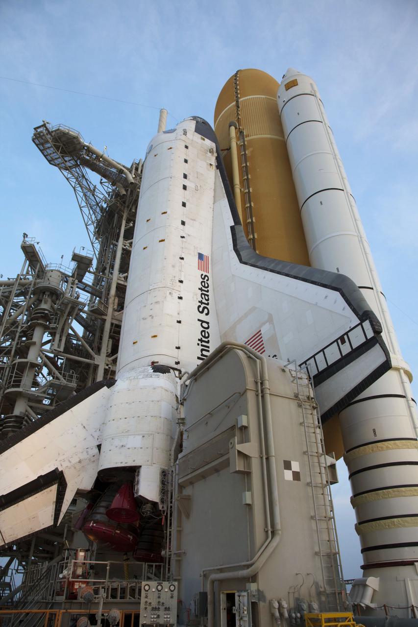 JSC2011-E-050269 (1 June 2011) --- Sunrise at Launch Pad 39A at NASA's Kennedy Space Center in Florida finds space shuttle Atlantis after completing its historic and final journey from the Vehicle Assembly Building. Atlantis was secured or "hard down," at its seaside launch pad at 3:29 a.m. (EDT) on June 1, 2011. The milestone move, known as "rollout," paves the way for the launch of the STS-135 mission to the International Space Station, targeted for July 8. STS-135 will be the 33rd flight of Atlantis, the 37th shuttle mission to the space station, and the 135th and final mission of NASA's Space Shuttle Program. Photo credit: NASA