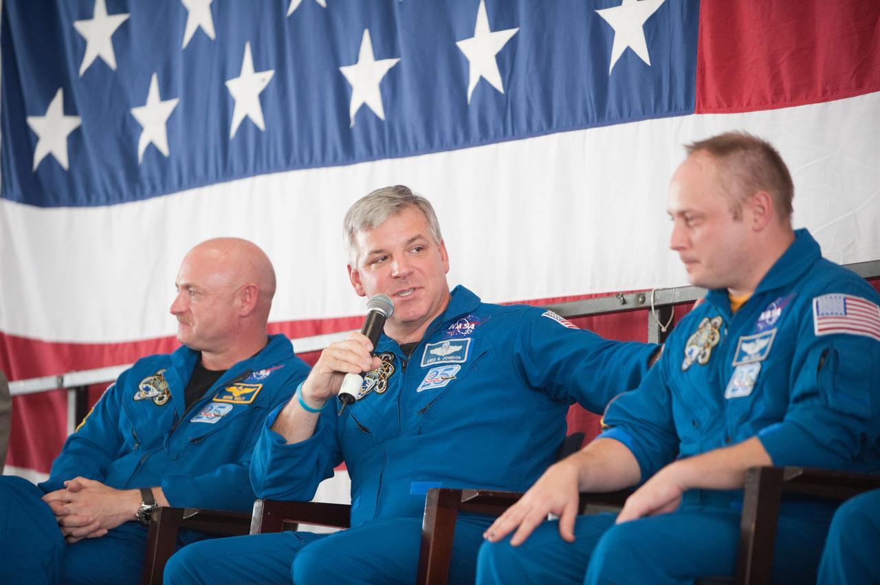 JSC2011-E-050705 (2 June 2011) --- NASA astronauts Mark Kelly (left), STS-134 commander; Greg H. Johnson, pilot; and Michael Fincke, mission specialist, are pictured during the STS-134 crew return ceremony on June 2, 2011 at Ellington Field near NASA's Johnson Space Center. Photo credit: NASA
