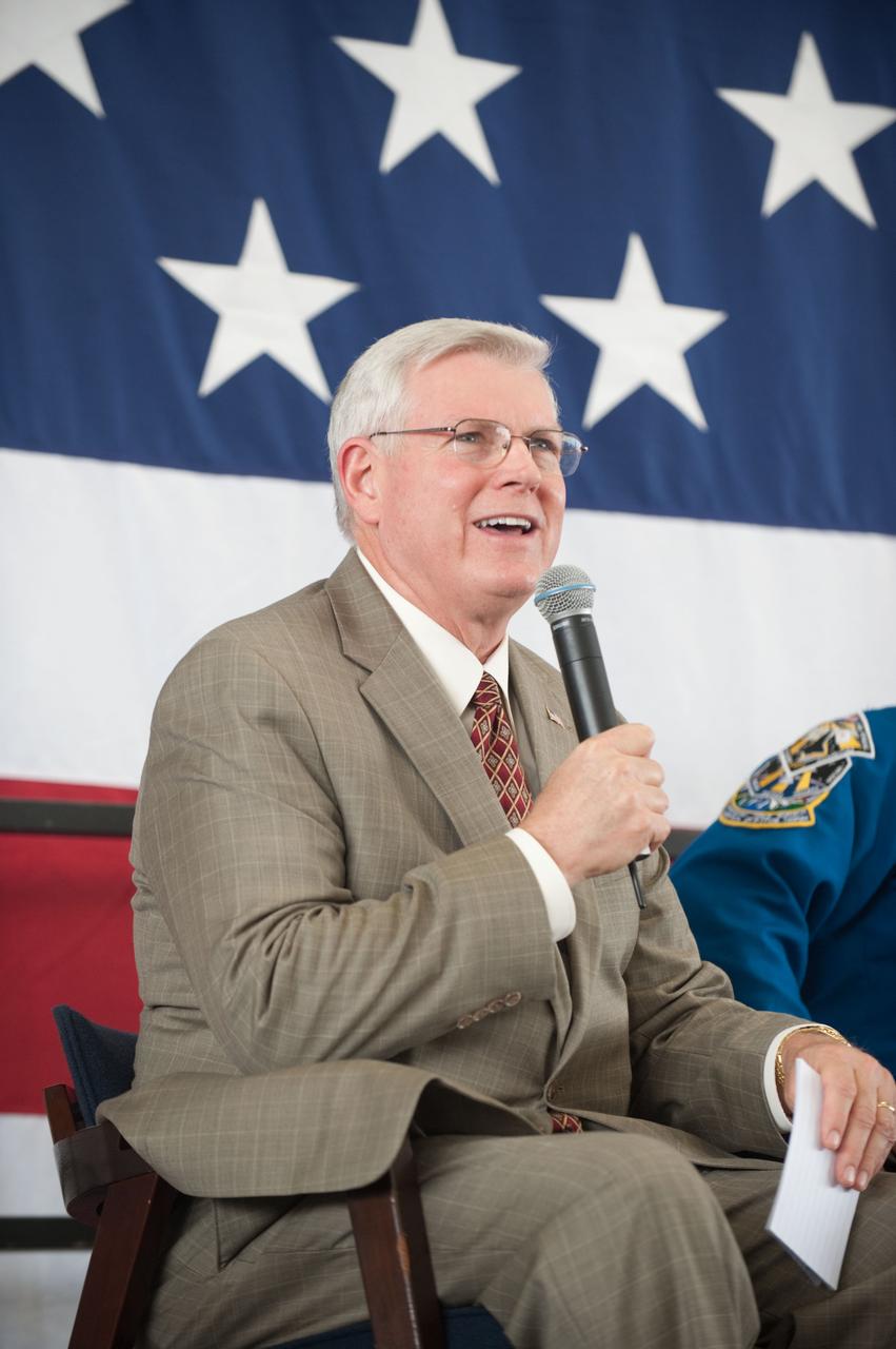 JSC2011-E-050757 (2 June 2011) --- NASA's Johnson Space Center director Michael L. Coats addresses a large crowd of well-wishers at the STS-134 crew return ceremony on June 2, 2011 at Ellington Field near JSC. Photo credit: NASA