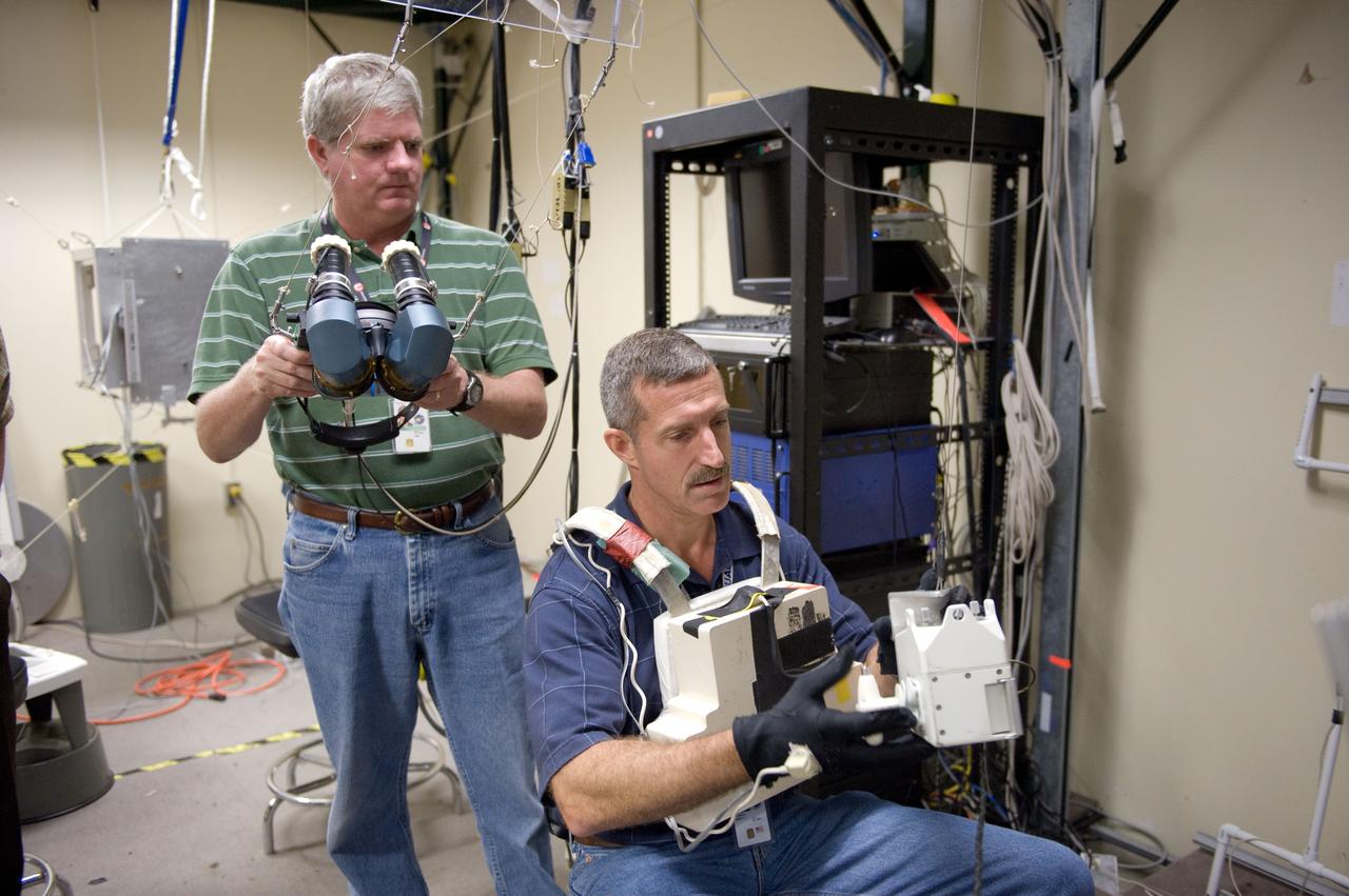 Expedition 29/30 astronaut Dan Burbank during SAFER Proficiency Training in the VR Lab.  Photo Date: June 17, 2011.  Location: Building 9 - Virtual Reality Lab.  Photographer: Robert Markowitz