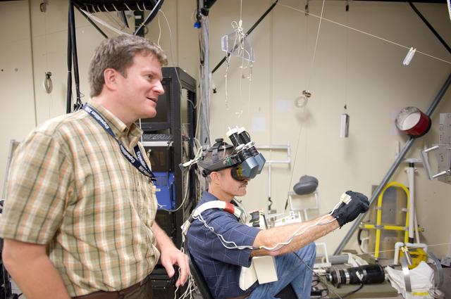 NASA image: Expedition 29/30 astronaut Dan Burbank during SAFER Proficiency Training in the VR Lab.    