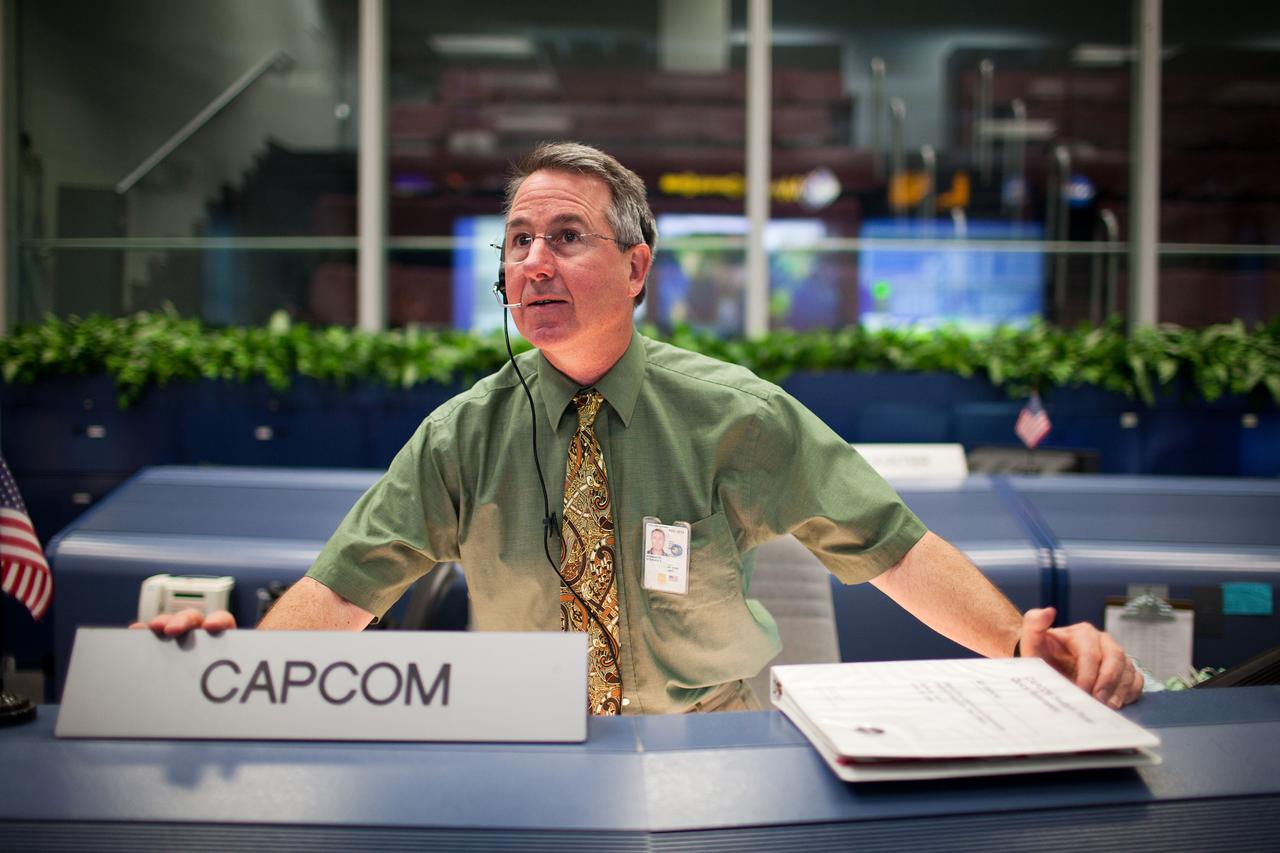 JSC2011-E-059389 (11 May 2011) --- Astronaut Steve Robinson, STS-135 CAPCOM,  works in the Mission Control Center at NASA?s Johnson Space Center during a simulation exercise with the crew on May 11, 2011. Photo credit: NASA Photo/Houston Chronicle, Smiley N. Pool
