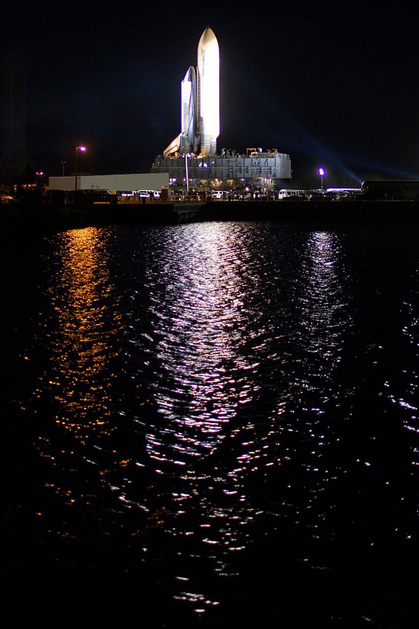 The space shuttle Atlantis moves to Launch Pad 39A during rollout at the Kennedy Space Center on Tuesday, May 31, 2011, in Florida. ( NASA Photo / Houston Chronicle, Smiley N. Pool ).