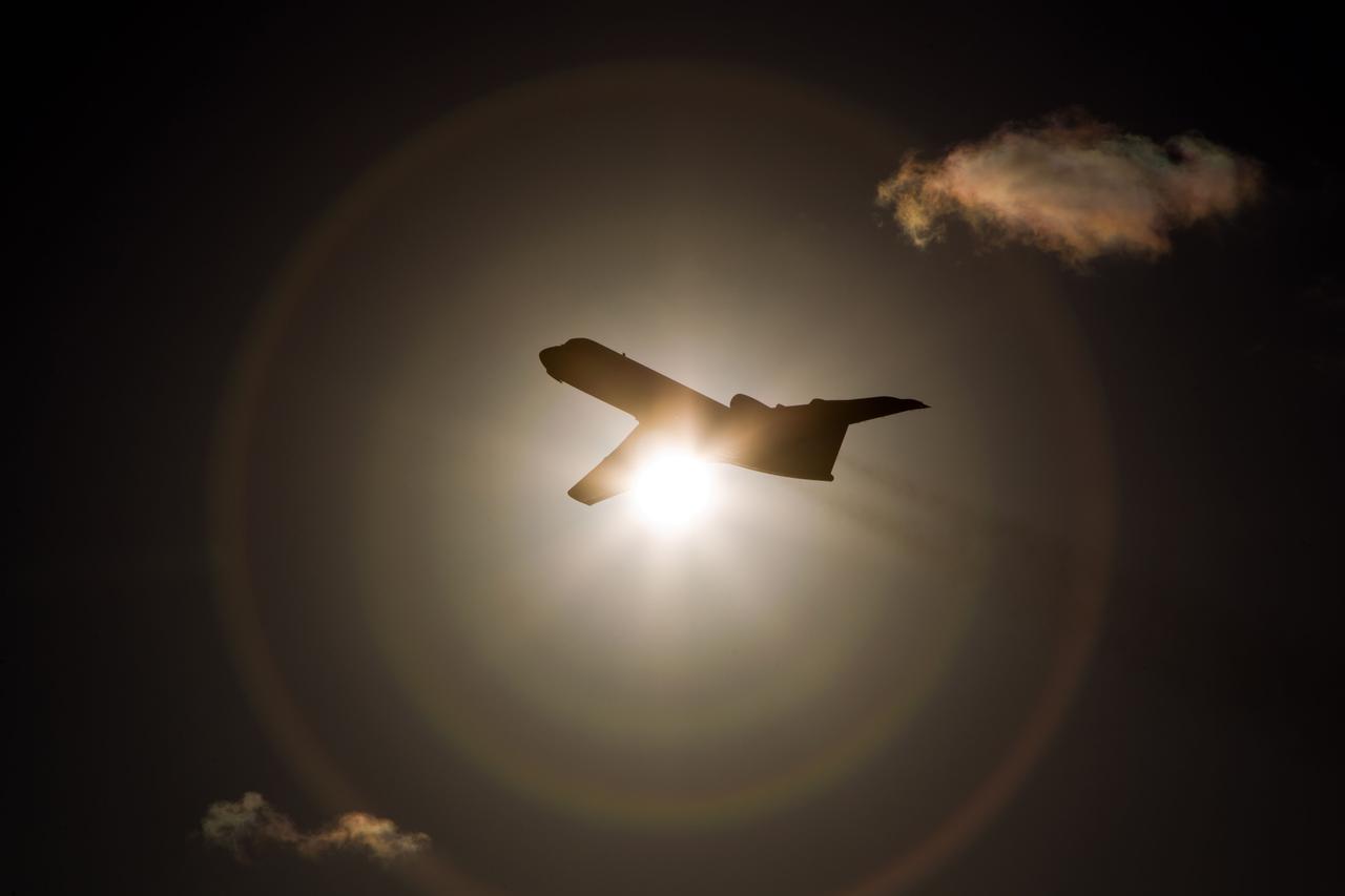 JSC2011-E-059482 (31 May 2011) --- A Shuttle Training Aircraft (STA) piloted by NASA astronaut Chris Ferguson, STS-135 commander, is seen against the late afternoon sun as the crew of the final space shuttle mission practices landings at NASA?s Kennedy Space Center in Florida May 31. Photo credit: NASA Photo/Houston Chronicle, Smiley N. Pool