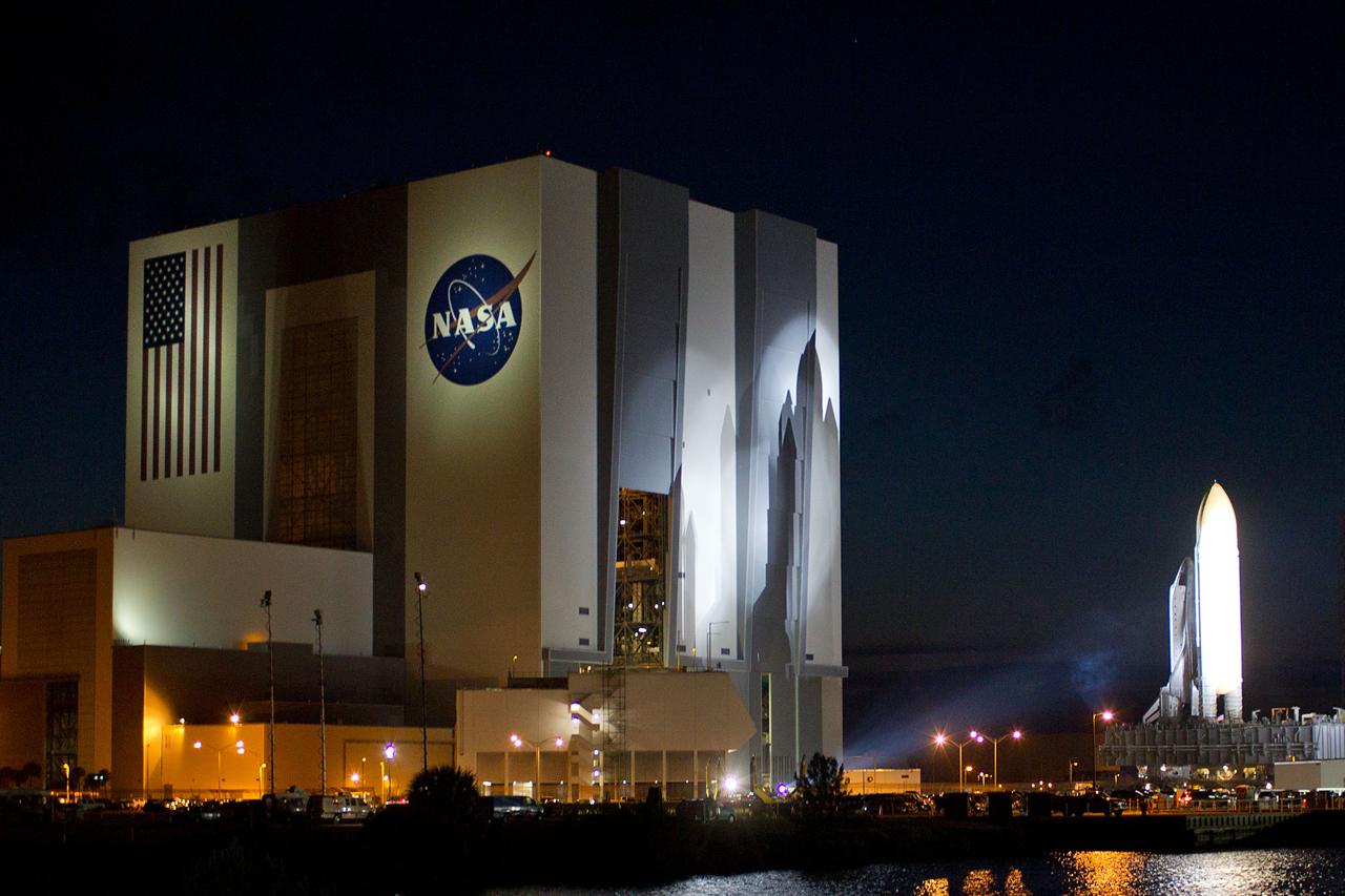 JSC2011-E-059488 (31 May 2011) --- The space shuttle Atlantis moves away from the Vehicle Assembly Building on its way to Launch Pad 39A during rollout at NASA?s Kennedy Space Center in Florida on May 31, 2011. Photo credit: NASA Photo/Houston Chronicle, Smiley N. Pool