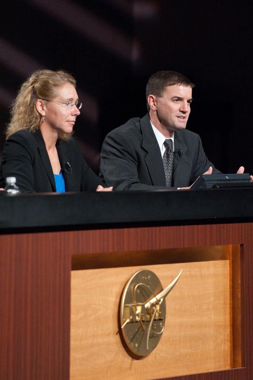 JSC2011-E-060424 (30 June 2011) --- NASA astronauts Sandy Magnus and Rex Walheim, both STS-135 mission specialists, are pictured during a preflight press conference at NASA's Johnson Space Center. Photo credit: NASA