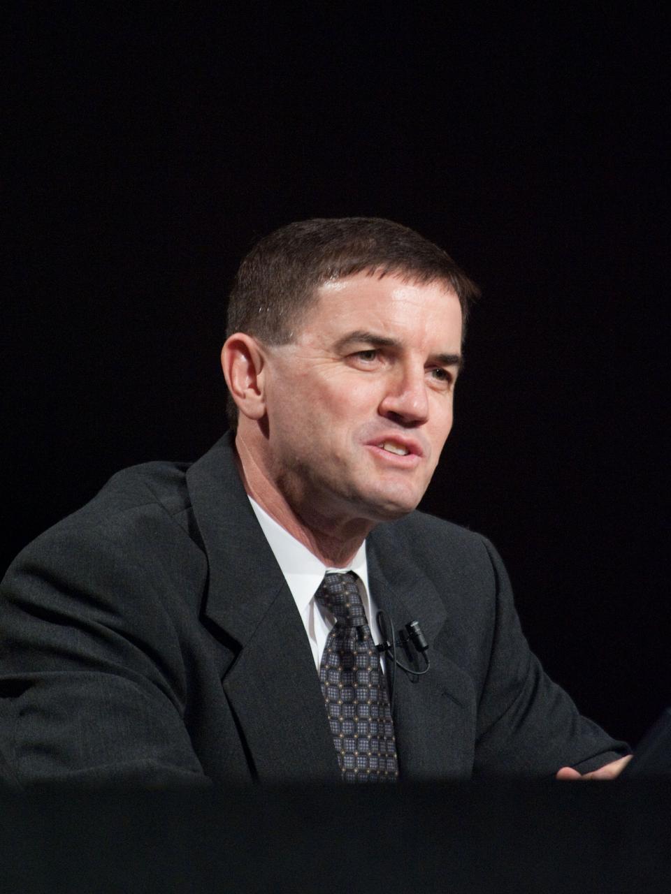 JSC2011-E-060450 (30 June 2011) --- NASA astronaut Rex Walheim, STS-135 mission specialist, responds to a question from a reporter during a preflight press conference at NASA's Johnson Space Center. Photo credit: NASA