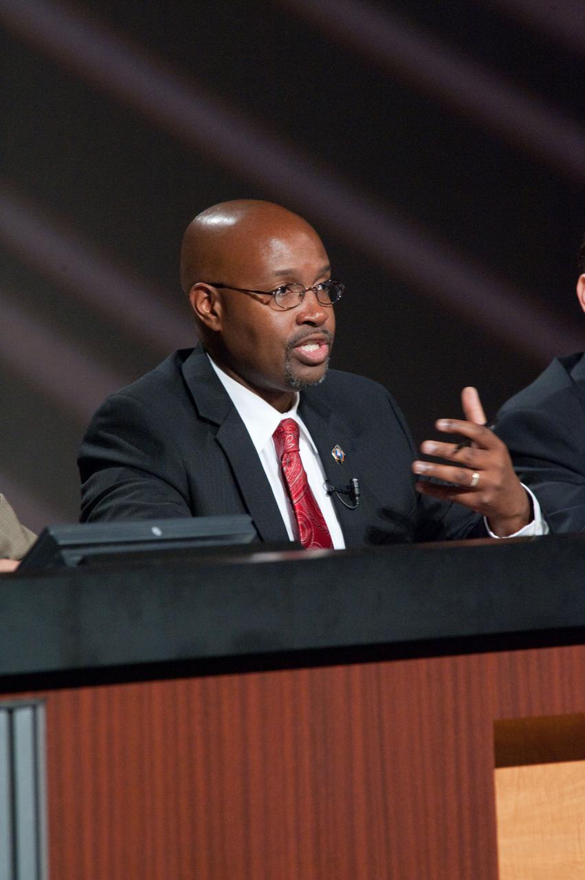 JSC2011-E-060720 (30 June 2011) -- STS-135 lead flight director Kwatsi Alibaruho responds to a question from a reporter during a mission overview press conference at NASA's Johnson Space Center. Photo credit: NASA