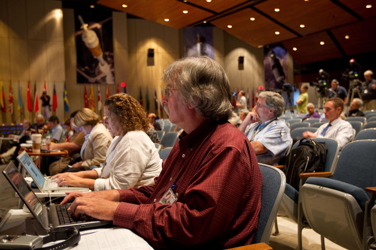 JSC2011-E-060796 (30 June 2011) --- Reporter Mark Carreau of Aviation Week takes notes during the STS-135 crew media briefing at NASA?s Johnson Space Center on June 30, 2011. The press conference provided the last scheduled opportunity for a large group of press to speak with the crew before the final launch on July 8. Photo credit: NASA Photo/Houston Chronicle, Smiley N. Pool