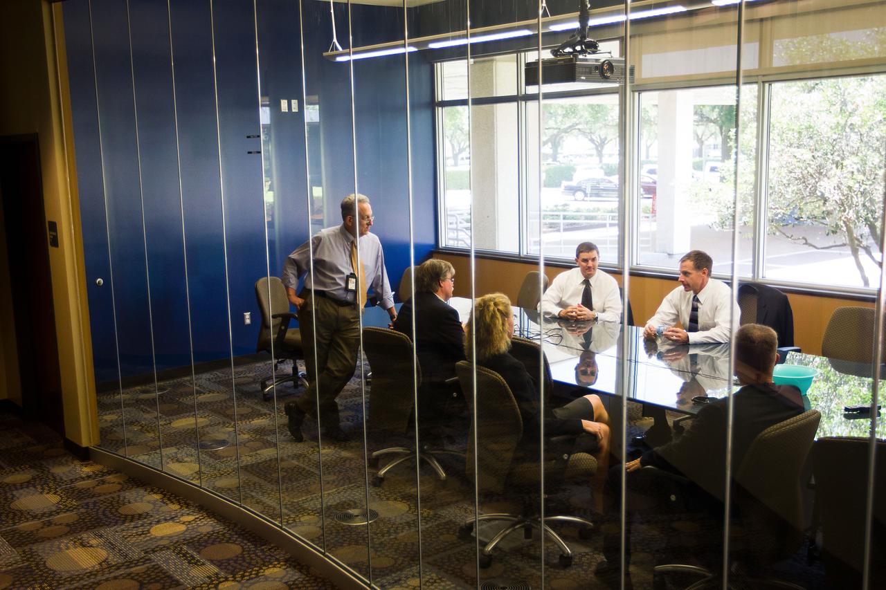 JSC2011-E-060800 (30 June 2011) --- The STS-135 crew meets with the Johnson Space Center public affairs team before the crew's media briefing at NASA?s Johnson Space Center in Houston on June 30, 2011. The press conference provided the last scheduled opportunity for a large group of press to speak with the crew before the final launch on July 8. Shown, from left, are Rob Navias and James Hartsfield of public affairs, and NASA astronauts Sandy Magnus, Rex Walheim, Chris Ferguson and Doug Hurley. Photo credit: NASA Photo/Houston Chronicle, Smiley N. Pool