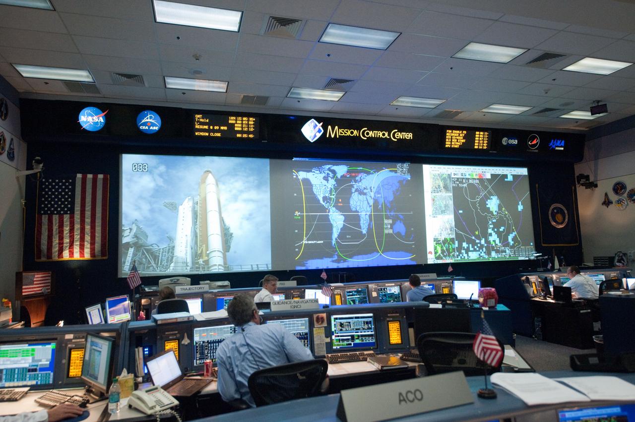 Photo Date: 7-8-2011 Subject: STS135 flight controllers on console during last shuttle mission Location: B. 30S WFCR and SMG Photographer: Bill Stafford