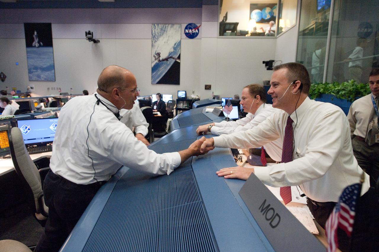Photo Date: 7-8-2011 Subject: STS135 flight controllers on console during last shuttle mission Location: B. 30S WFCR and SMG Photographer: Bill Stafford