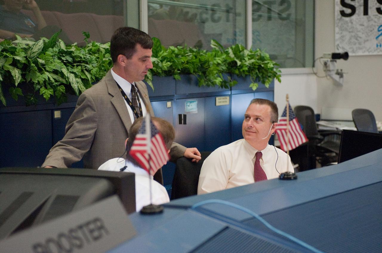 PHOTO DATE: 08 July 2011 LOCATION: Bldg. 30 south - WFCR, SMG SUBJECT: STS-135 Flight Controllers on Console during last space shuttle launch WORK ORDER:  01815-BS___07-08-11-STS 135 LAUNCH WFCR PHOTOGRAPHER: Bill Stafford