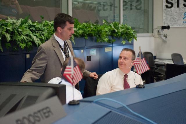 NASA image: STS135 flight controllers on console during last shuttle mission