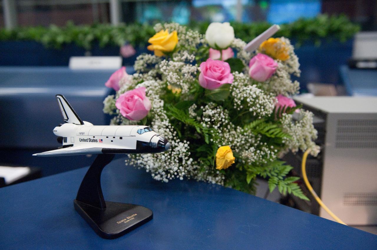 PHOTO DATE: 12 July 2011 LOCATION: Bldg. 30 FCR-1, EVA, WFCR & Bldg. 7 EVA Center. SUBJECT: STS-135 flight controllers on console for EVA. PHOTOGRAPHER: Mark Sowa