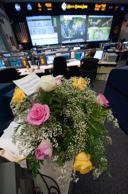 NASA image: STS-135 Flight Controllers on Console. Orbit 3