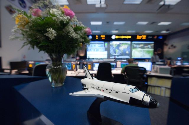 NASA image: STS-135 Flight Controllers on Console. Orbit 3