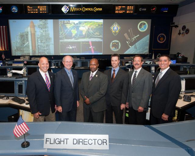 NASA image: STS-135 Flight Controllers on Console 
