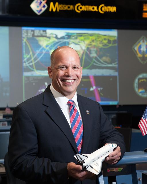 NASA image: STS-135 Flight Controllers on Console 