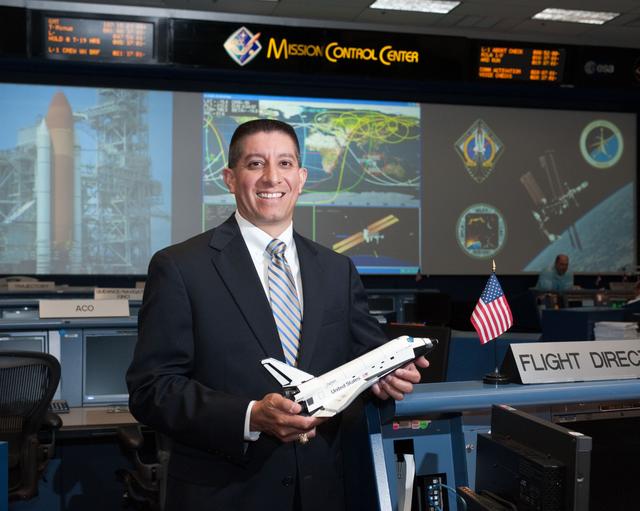 NASA image: STS-135 Flight Controllers on Console 