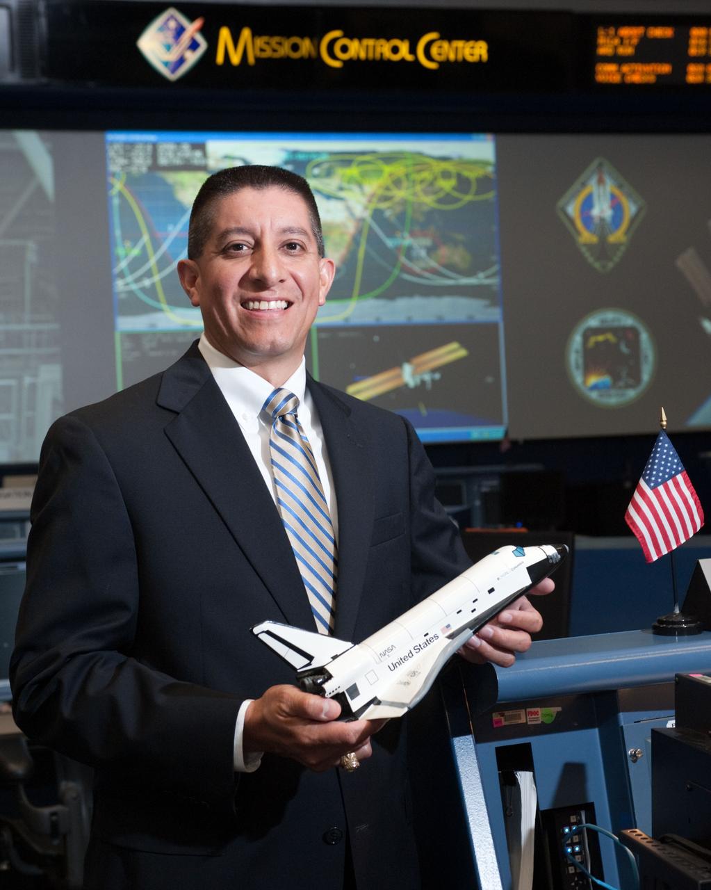 PHOTO DATE:   07-06-11 LOCATION: Bldg. 30 SUBJECT: STS-135 Flight Controllers on Console  WORK ORDER:01910-BS___STS 135 FLIGHT DIRECTORS-07-06-11 PHOTOGRAPHER: BILL STAFFORD