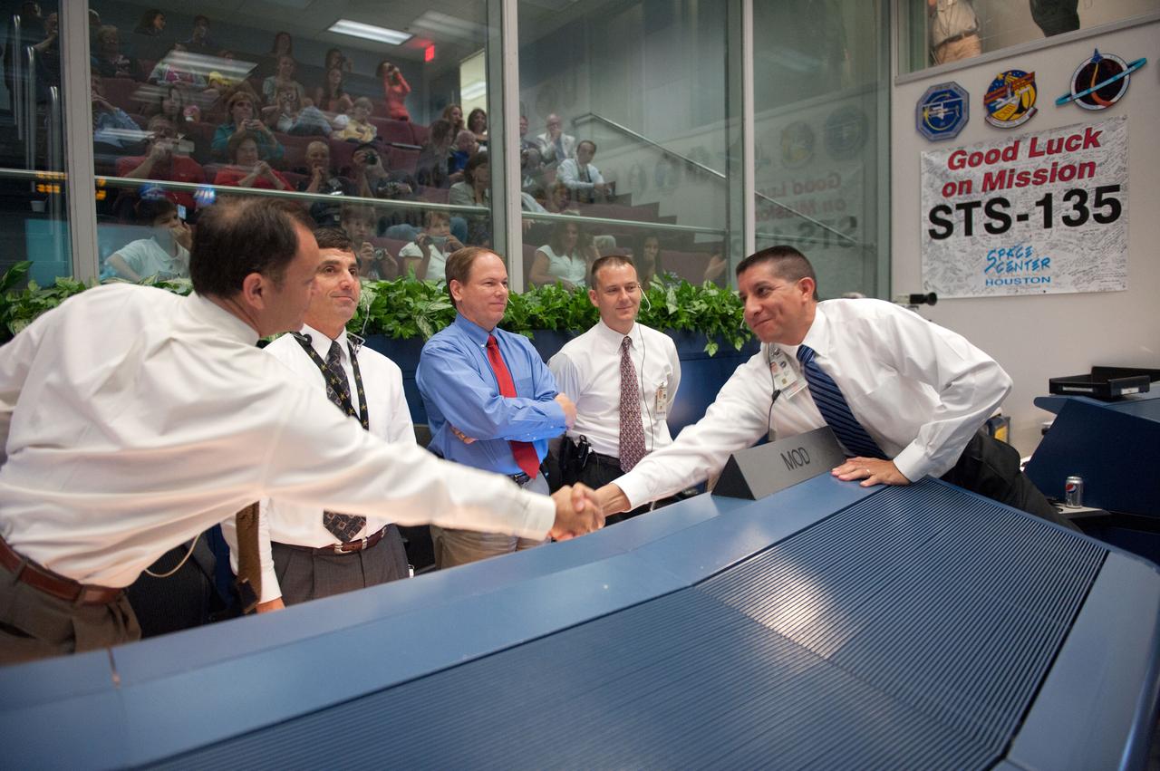 PHOTO DATE: 21 July 2011 LOCATION: Bldg. 30south, WFCR SUBJECT: STS-135 Entry flight control team in WFCR during the landing of space shuttle Atlantis. PHOTOGRAPHER: Robert Markowitz