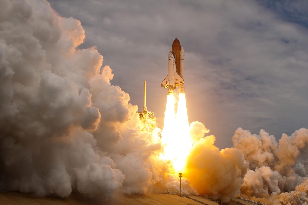 JSC2011-E-067644 (8 July 2011) --- The space shuttle Atlantis launches for the STS-135 mission to the International Space Station in the final mission of the Space Shuttle Program at NASA?s Kennedy Space Center in Florida. Liftoff was at 11:29 a.m. (EDT) on July 8, 2011. Onboard are NASA astronauts Chris Ferguson, STS-135 commander; Doug Hurley, pilot; Sandy Magnus and Rex Walheim, both mission specialists. Photo credit: NASA Photo/Houston Chronicle, Smiley N. Pool