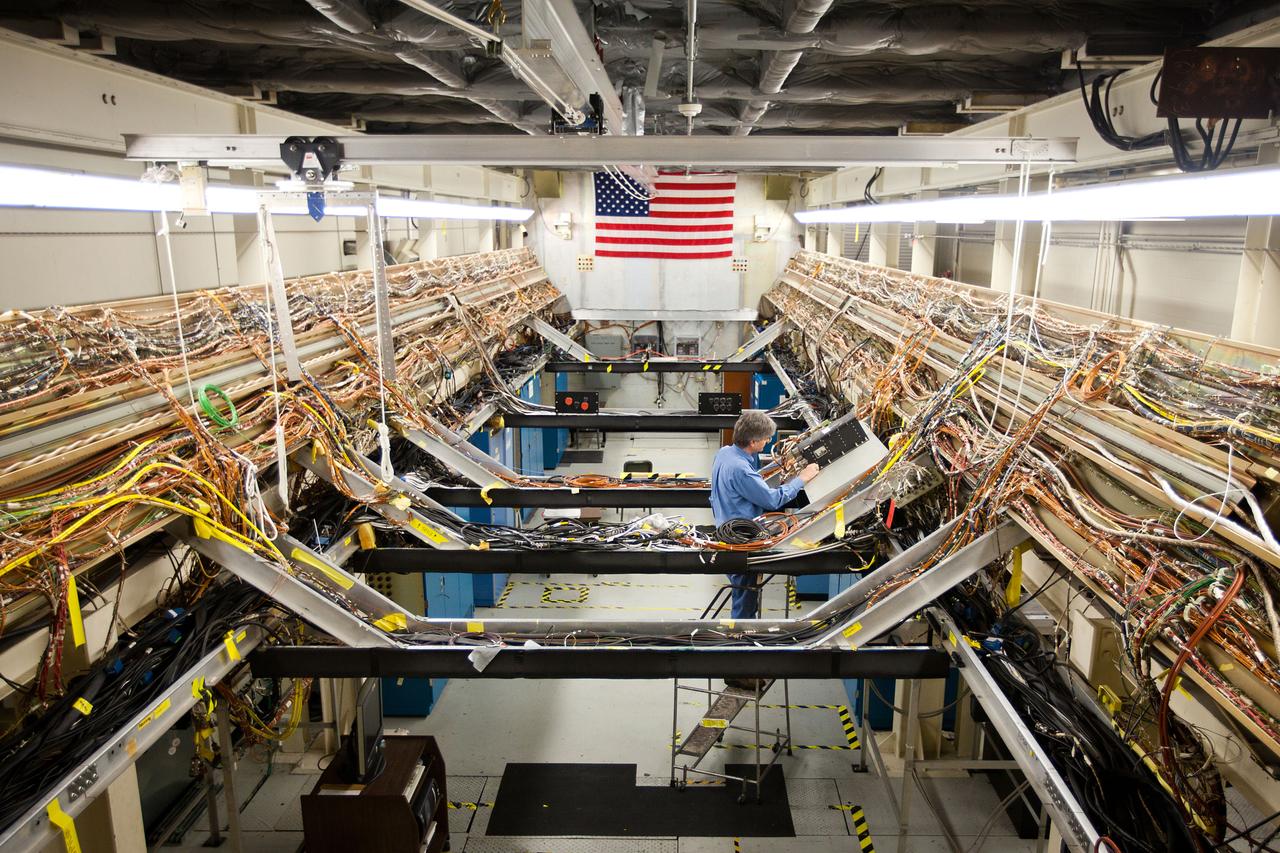 JSC2011-E-067679 (12 July 2011) --- This is an overall view of the wiring for the simulated shuttle payload bay in the Shuttle Avionics Integration Laboratory (SAIL) at the Johnson Space Center in Houston on July 12, 2011. The laboratory is a skeletal avionics version of the shuttle that uses actual orbiter hardware and flight software. The facility even carries the official orbiter designation as Orbiter Vehicle 095. Photo credit: NASA Photo/Houston Chronicle, Smiley N. Pool