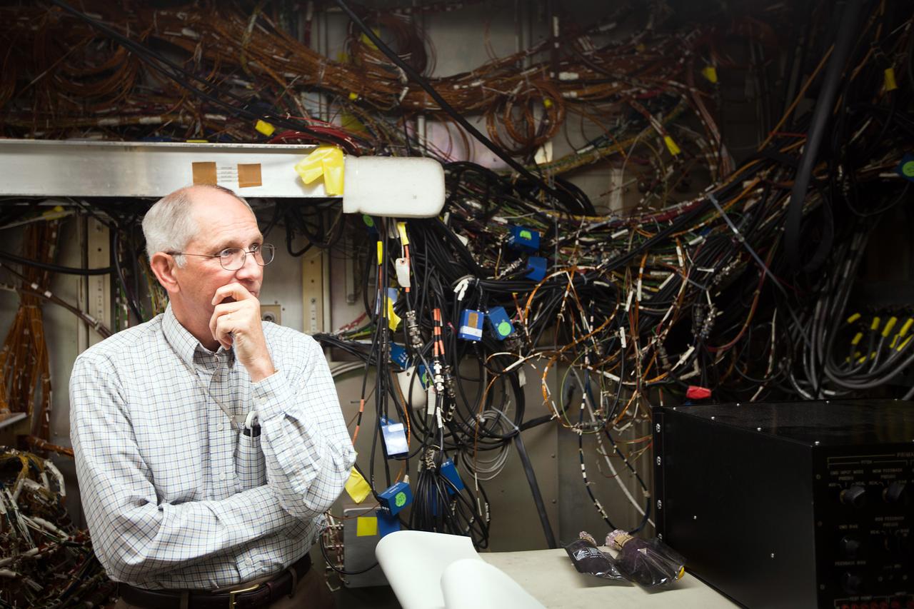 JSC2011-E-067682 (12 July 2011) --- Chief engineer Frank Svrecek pauses in the Shuttle Avionics Integration Laboratory (SAIL) at the Johnson Space Center in Houston July 12, 2011. The laboratory is a skeletal avionics version of the shuttle that uses actual orbiter hardware and flight software. The facility is referred to as Orbiter Vehicle 095. Photo credit: NASA Photo/Houston Chronicle, Smiley N. Pool
