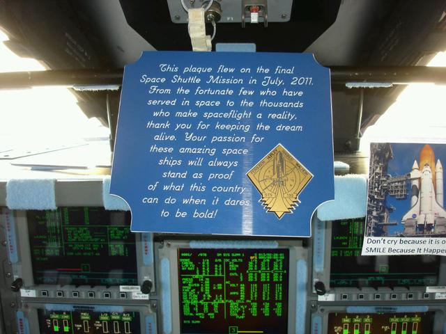JSC2011-E-068995 (21 July 2011) --- The crew of STS-135 left this plaque in the cockpit of Atlantis as a tribute to all of the people who have worked on the Space Shuttle Program. Photo credit: NASA