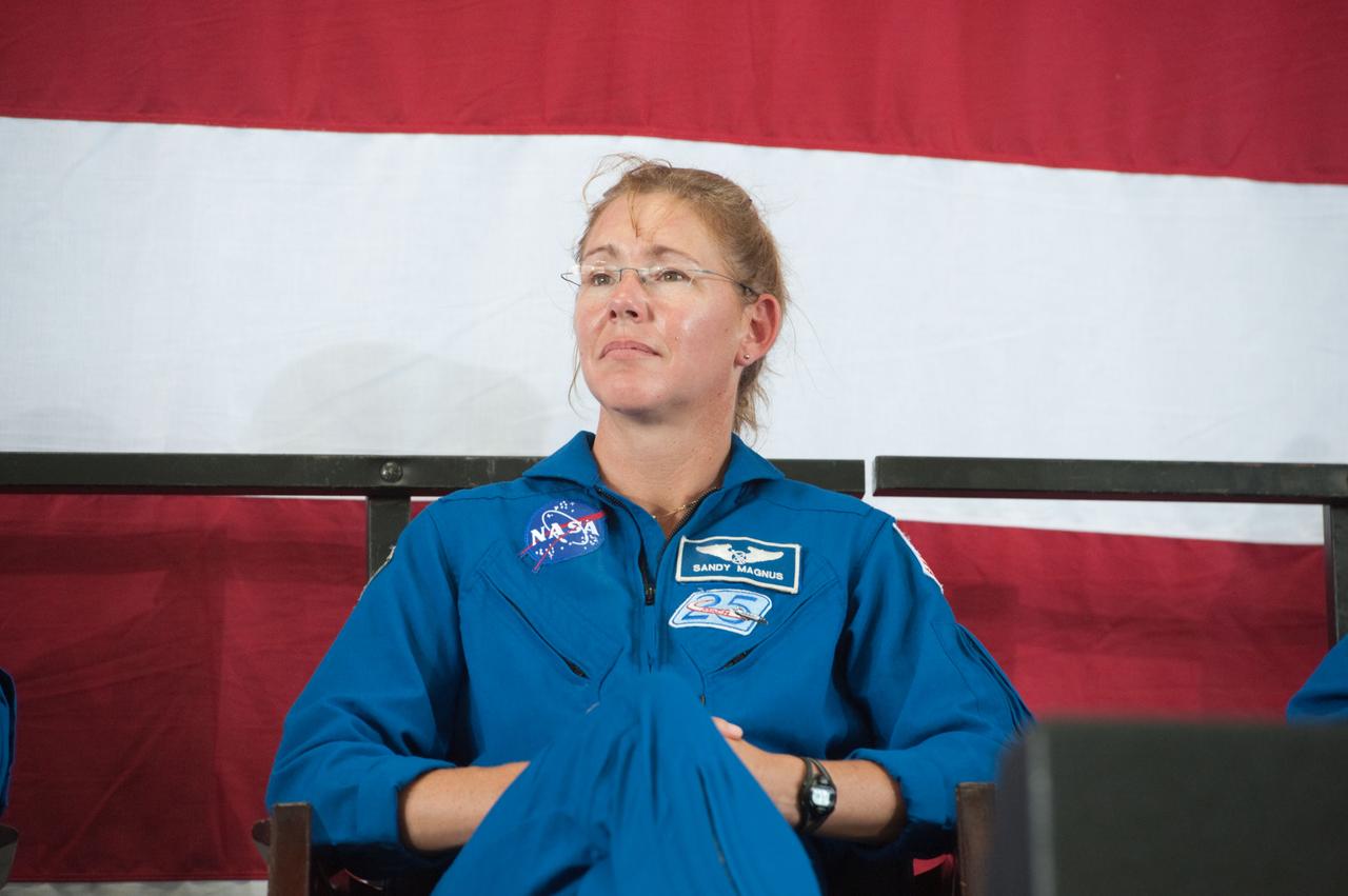 JSC2011-E-070464 (22 July 2011) --- NASA astronaut Sandy Magnus, STS-135 mission specialist, is pictured during the STS-135 crew return ceremony on July 22, 2011 at Ellington Field near NASA?s Johnson Space Center. Photo credit: NASA