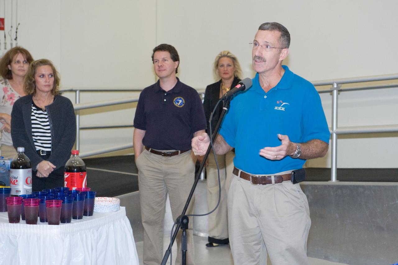 PHOTO DATE: 19 July 2011 LOCATION: Bldg. 5south, High Bay SUBJECT: Cake Cutting Ceremony marking the end of Expedition 29/30 training. PHOTOGRAPHER: Mark Sowa
