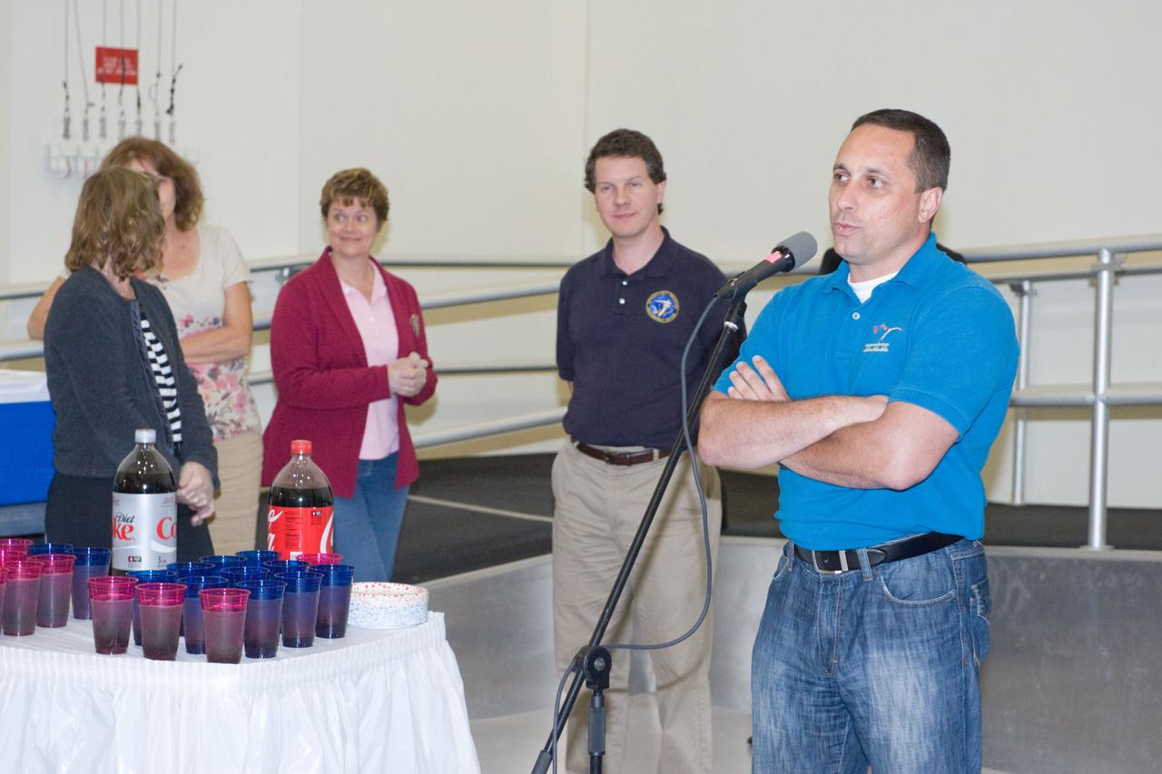 PHOTO DATE: 19 July 2011 LOCATION: Bldg. 5south, High Bay SUBJECT: Cake Cutting Ceremony marking the end of Expedition 29/30 training. PHOTOGRAPHER: Mark Sowa