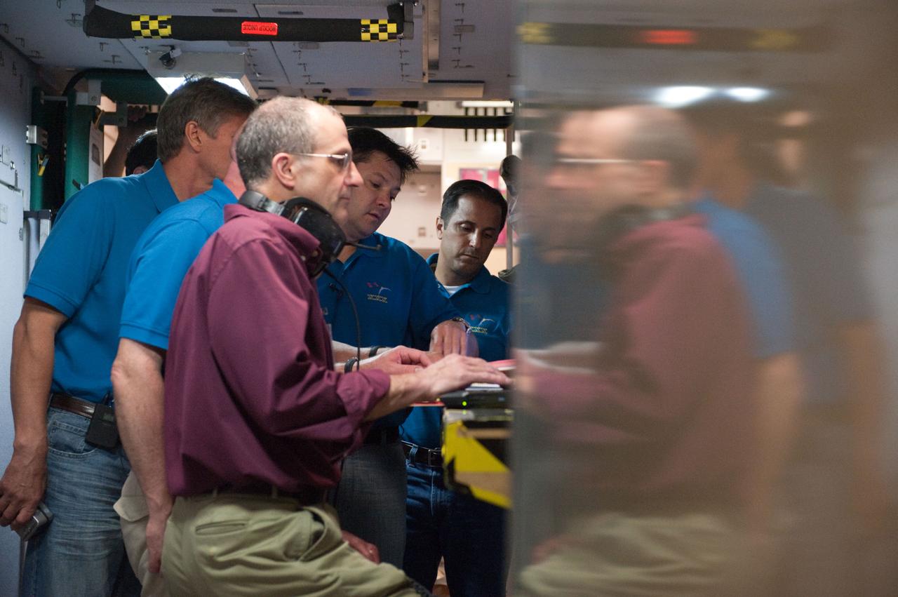 PHOTO DATE: 7-14-11  LOCATION: Bldg. 9NW - ISS Mockups    SUBJECT: Expedition 30/31/32 crew members during Emergency Scenarios. WORK ORDER:   02269-DCB_Exp 30-31-32 Training_07-14-11 PHOTOGRAPHER: Devin Boldt