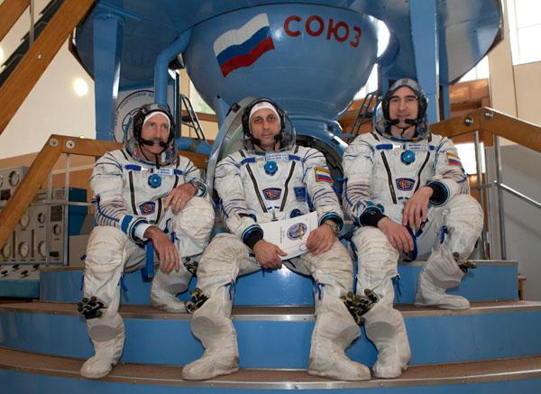 At the Gagarin Cosmonaut Training Center in Star City, Russia outside Moscow, Expedition 29 Flight Engineer Dan Burbank of NASA (left), Soyuz Commander Anton Shkaplerov (center) and Flight Engineer Anatoly Ivanishin take a break from their training August 26, 2011 as they prepare for their launch from the Baikonur Cosmodrome in Kazakhstan in their Soyuz TMA-22 spacecraft for a six-month stint on the International Space Station.  Photo credit:  Gagarin Cosmonaut Training Center
