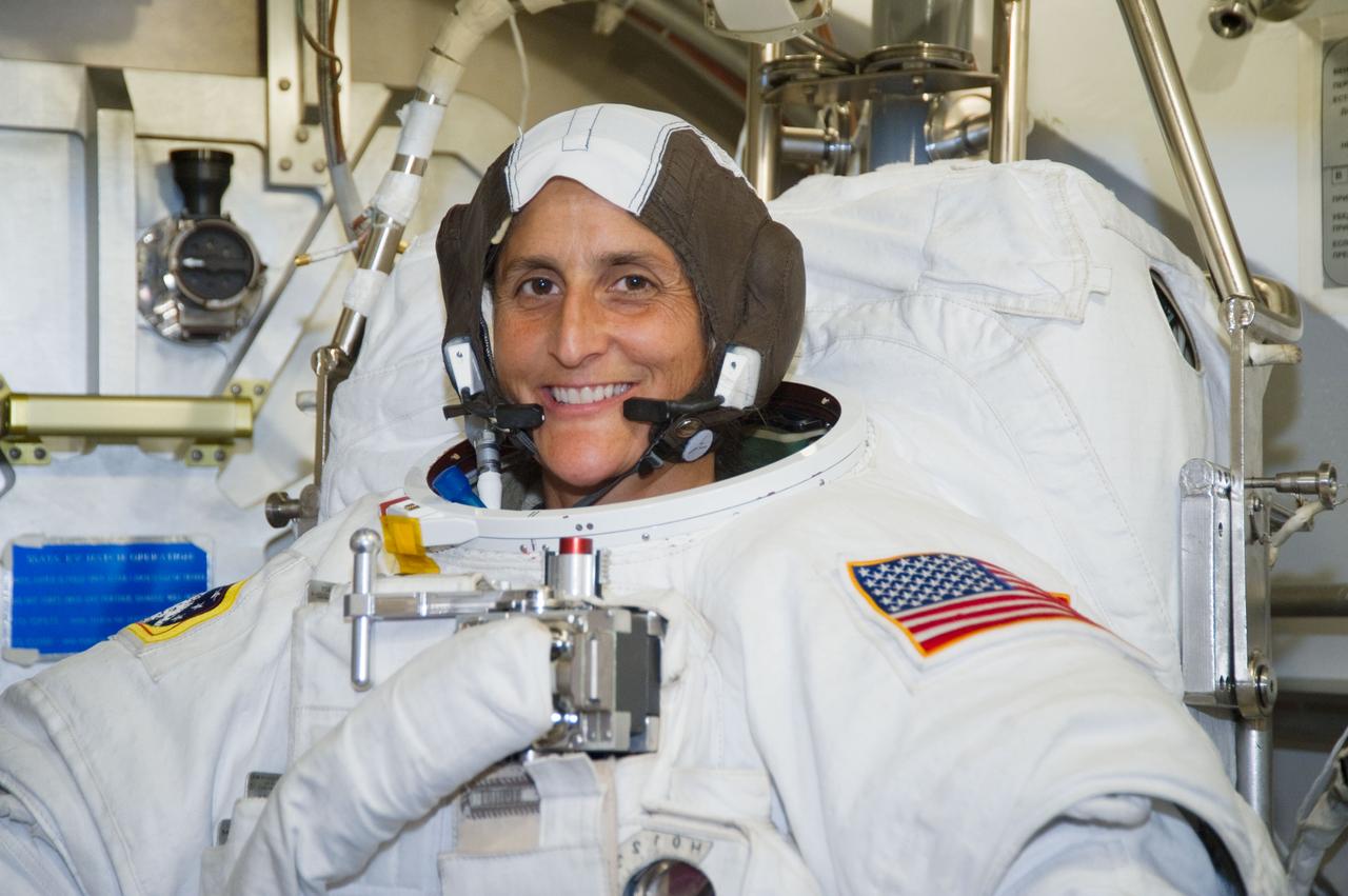 Expedition 32 crew member Sunita Williams during her EMU Training and Certification.  Photo Date: September 8, 2011.  Location: Building 7 - SSATA Chamber.  Photographer: Robert Markowitz