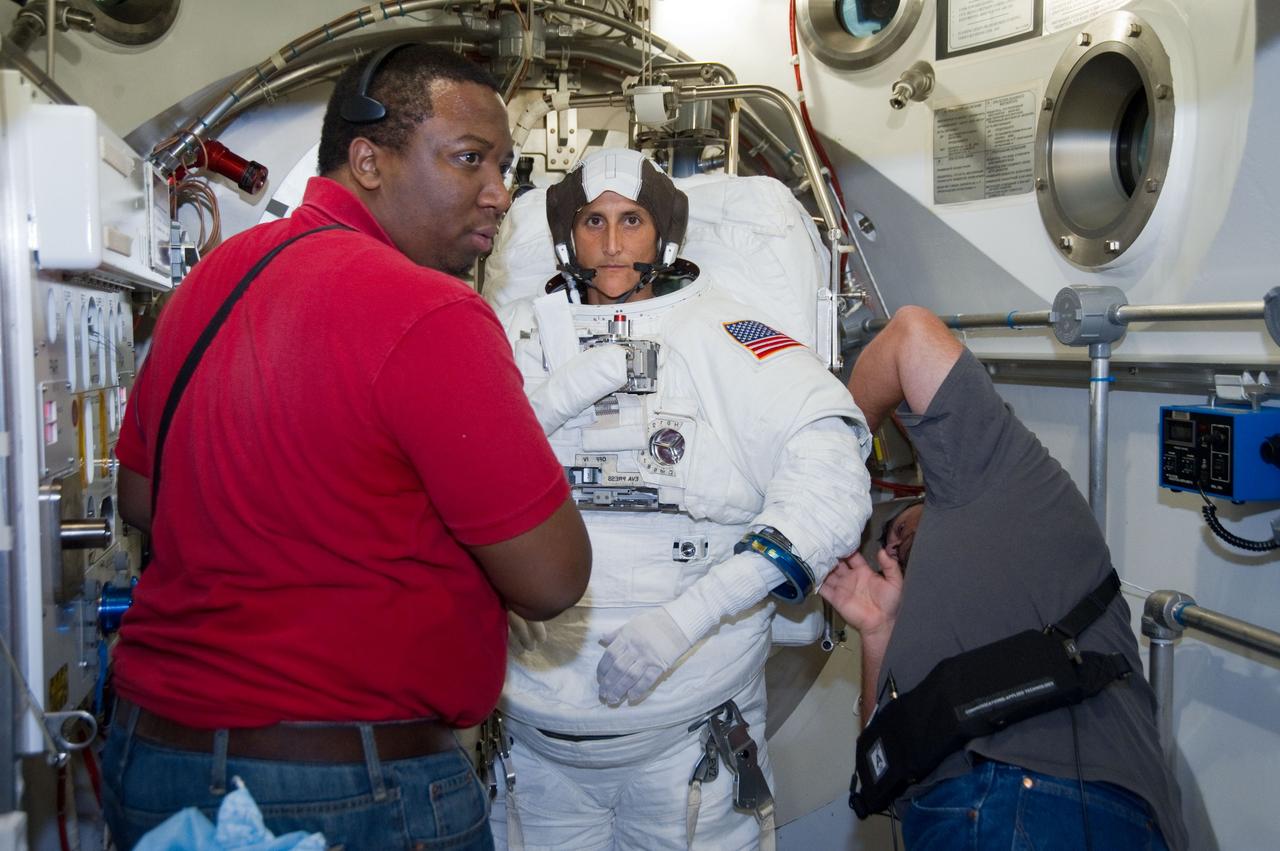 Expedition 32 crew member Sunita Williams during her EMU Training and Certification.  Photo Date: September 8, 2011.  Location: Building 7 - SSATA Chamber.  Photographer: Robert Markowitz