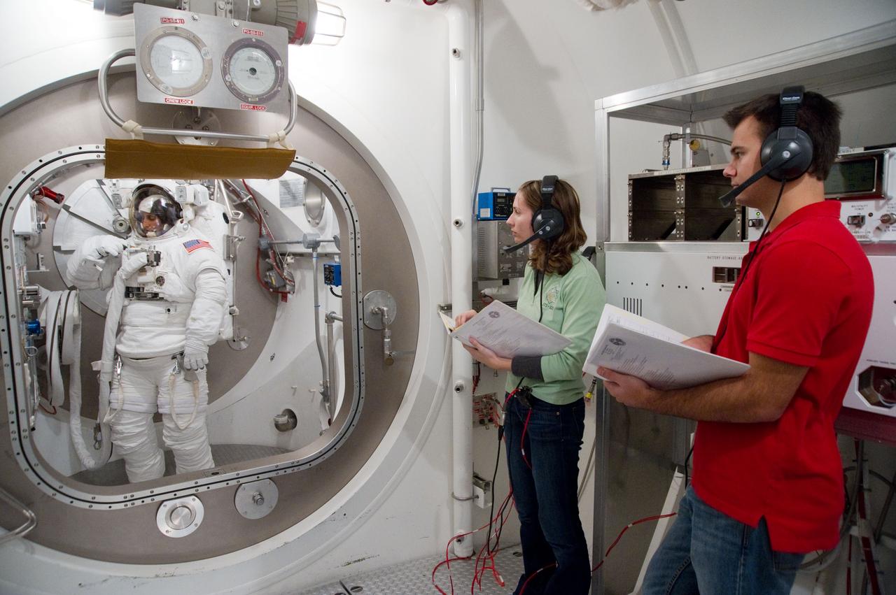 Expedition 32 crew member Sunita Williams during her EMU Training and Certification.  Photo Date: September 8, 2011.  Location: Building 7 - SSATA Chamber.  Photographer: Robert Markowitz