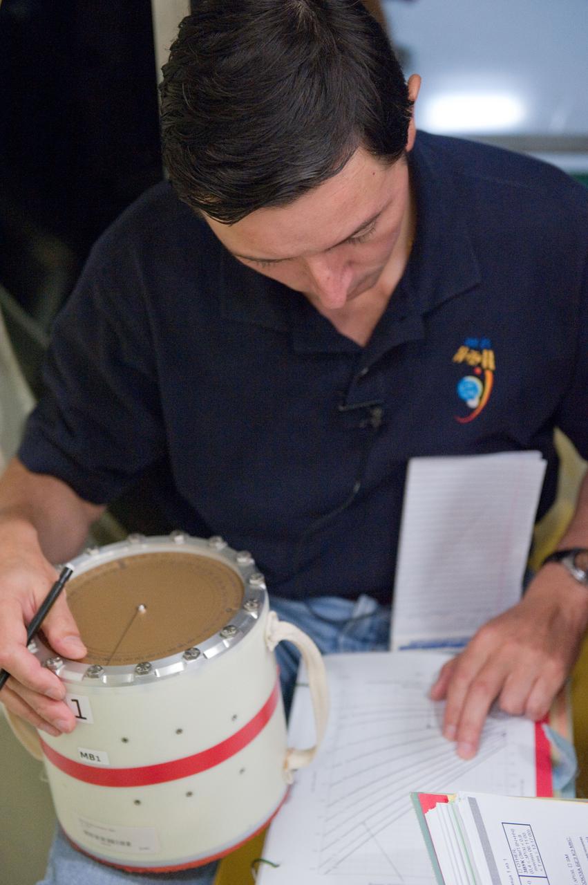 DATE: 10-17-11 LOCATION: Building 9 - ISS Trainers SUBJECT: Expedition 31/32 crew—Padalka, Revin and Acaba—during some of their Emergency Scenarios training. PHOTOGRAPHER: Lauren Harnett