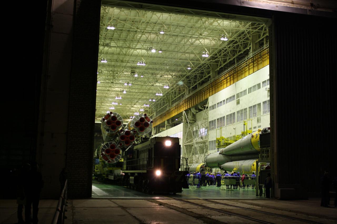At the Baikonur Cosmodrome in Kazakhstan, the Soyuz booster and its ISS Progress 45 cargo craft rolled to the launch pad in bone-chilling weather on October 28, 2011 in preparation for launch October 31 to send the unmanned Russian resupply vehicle to the International Space Station. The launch will be the first for this configuration of the Soyuz booster rocket since a third-stage engine failure in flight August 24 that resulted in the loss of the previous Progress cargo craft, the ISS Progress 44. ISS Progress 45 is loaded with almost three tons of food, fuel and supplies for the residents of the orbital laboratory. Credit: NASA