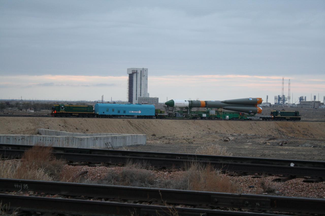 At the Baikonur Cosmodrome in Kazakhstan, the Soyuz booster and its ISS Progress 45 cargo craft rolled to the launch pad in bone-chilling weather on October 28, 2011 in preparation for launch October 31 to send the unmanned Russian resupply vehicle to the International Space Station. The launch will be the first for this configuration of the Soyuz booster rocket since a third-stage engine failure in flight August 24 that resulted in the loss of the previous Progress cargo craft, the ISS Progress 44. ISS Progress 45 is loaded with almost three tons of food, fuel and supplies for the residents of the orbital laboratory. Credit: NASA