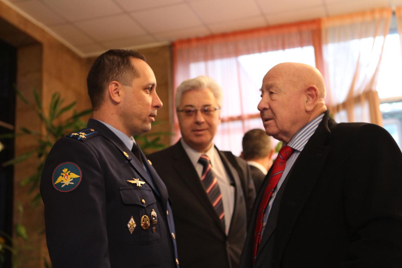 At the Gagarin Cosmonaut Training Center in Star City, Russia, Expedition 29/30 Soyuz Commander Anton Shkaplerov (left) shares a moment with legendary Russian cosmonaut Alexei Leonov (right), the first human to walk in space, during the departure ceremony October 31, 2011 for Shkaplerov, NASA’s Dan Burbank and Russian Flight Engineer Anatoly Ivanishin as they left for their launch site in Baikonur, Kazakhstan. The trio will launch November 14 from Baikonur on their Soyuz TMA-22 spacecraft for the International Space Station.  Credit: NASA 