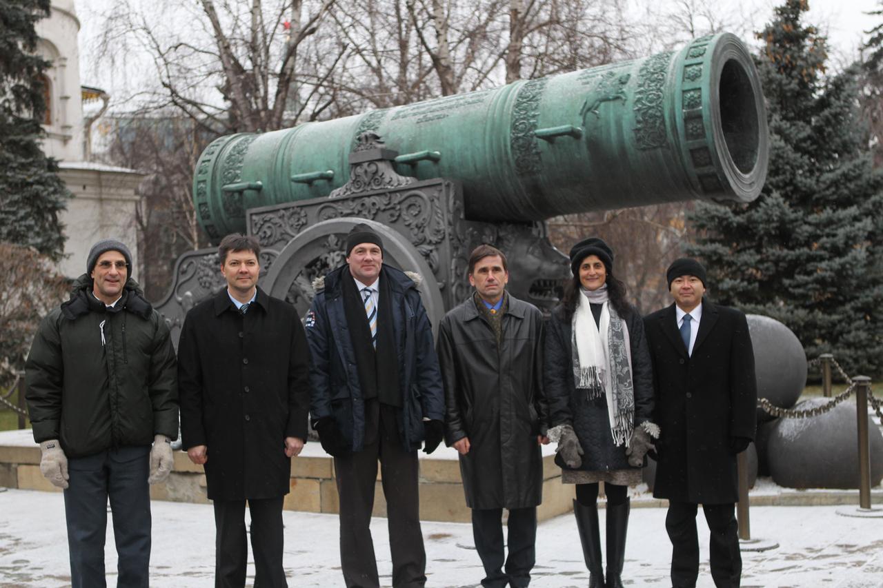 At the Kremlin in Moscow, the prime and backup crews for the next launch of crewmembers to the International Space Station pose for pictures Dec. 1, 2011 in front of the Tsar Cannon following ceremonial activities at Red Square. From left to right are the prime Expedition 30 crew --- NASA Flight Engineer Don Pettit, Soyuz Commander Oleg Kononenko and Flight Engineer Andre Kuipers of the European Space Agency, and the backup crew – Soyuz Commander Yuri Malenchenko, NASA Flight Engineer Suni Williams and Flight Engineer Aki Hoshide of the Japan Aerospace Exploration Agency. Pettit, Kononenko and Kuipers will launch Dec. 21 from the Baikonur Cosmodrome in Kazakhstan on the Soyuz TMA-03M spacecraft.  Credit: NASA 