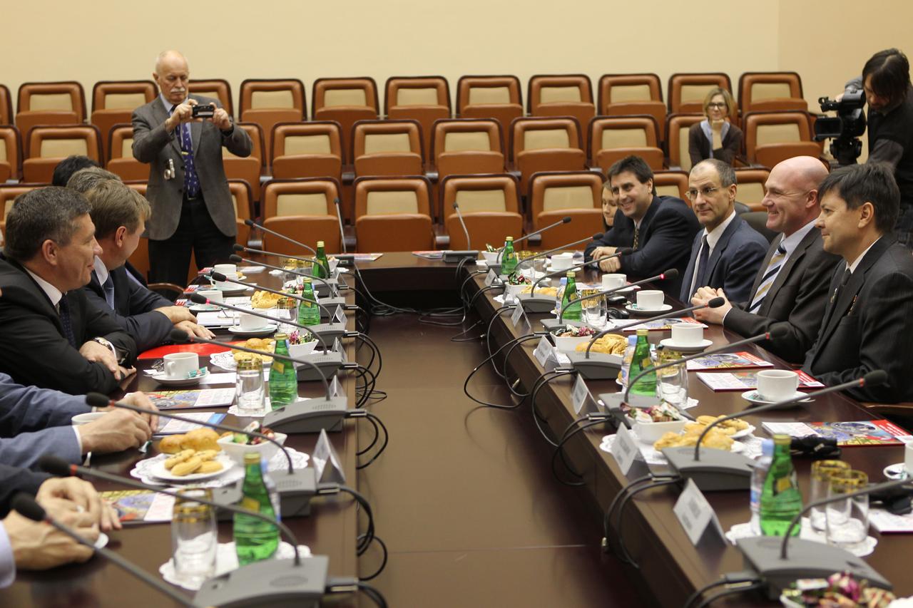 At the headquarters of the Russian Federal Space Agency, the head of Roscosmos, Vladimir Popovkin (far left) and other Russian space officials spend time with the Expedition 30/31 prime crewmembers Dec. 6, 2011 prior to their departure Dec. 8 for their launch site in Baikonur, Kazakhstan. On the right from top to bottom are Joel Montalbano, NASA’s Head of Human Spaceflight Programs in Russia, NASA Flight Engineer Don Pettit, European Space Agency Flight Engineer Andre Kuipers and Soyuz Commander Oleg Kononenko. Pettit, Kuipers and Kononenko will launch to the International Space Station Dec. 21 in their Soyuz TMA-03M spacecraft.  Credit: NASA 