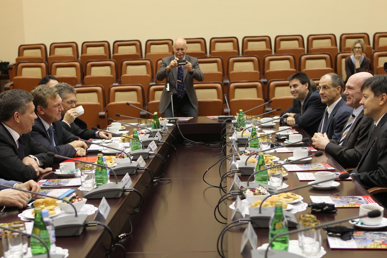 At the headquarters of the Russian Federal Space Agency, the head of Roscosmos, Vladimir Popovkin (far left) and the head of Piloted Space Programs, Alexei Krasnov (to Popovkin’s left) spend time with the Expedition 30/31 prime crewmembers Dec. 6, 2011 prior to their departure Dec. 8 for their launch site in Baikonur, Kazakhstan. On the right from top to bottom are Joel Montalbano, NASA’s Head of Human Spaceflight Programs in Russia, NASA Flight Engineer Don Pettit, European Space Agency Flight Engineer Andre Kuipers and Soyuz Commander Oleg Kononenko. Pettit, Kuipers and Kononenko will launch to the International Space Station Dec. 21 in their Soyuz TMA-03M spacecraft.  Credit: NASA 